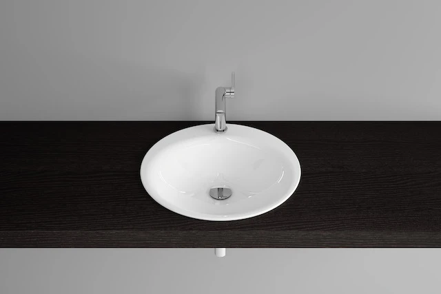 Einbauwaschtisch „BetteLux“, ohne Überlauf, ohne Hahnlochbohrung ⌀ 50 × 10 cm in Manhattan Einbauwaschtisch „BetteLux“, ohne Überlauf, ohne Hahnlochbohrung ⌀ 50 × 10 cm in Manhattan