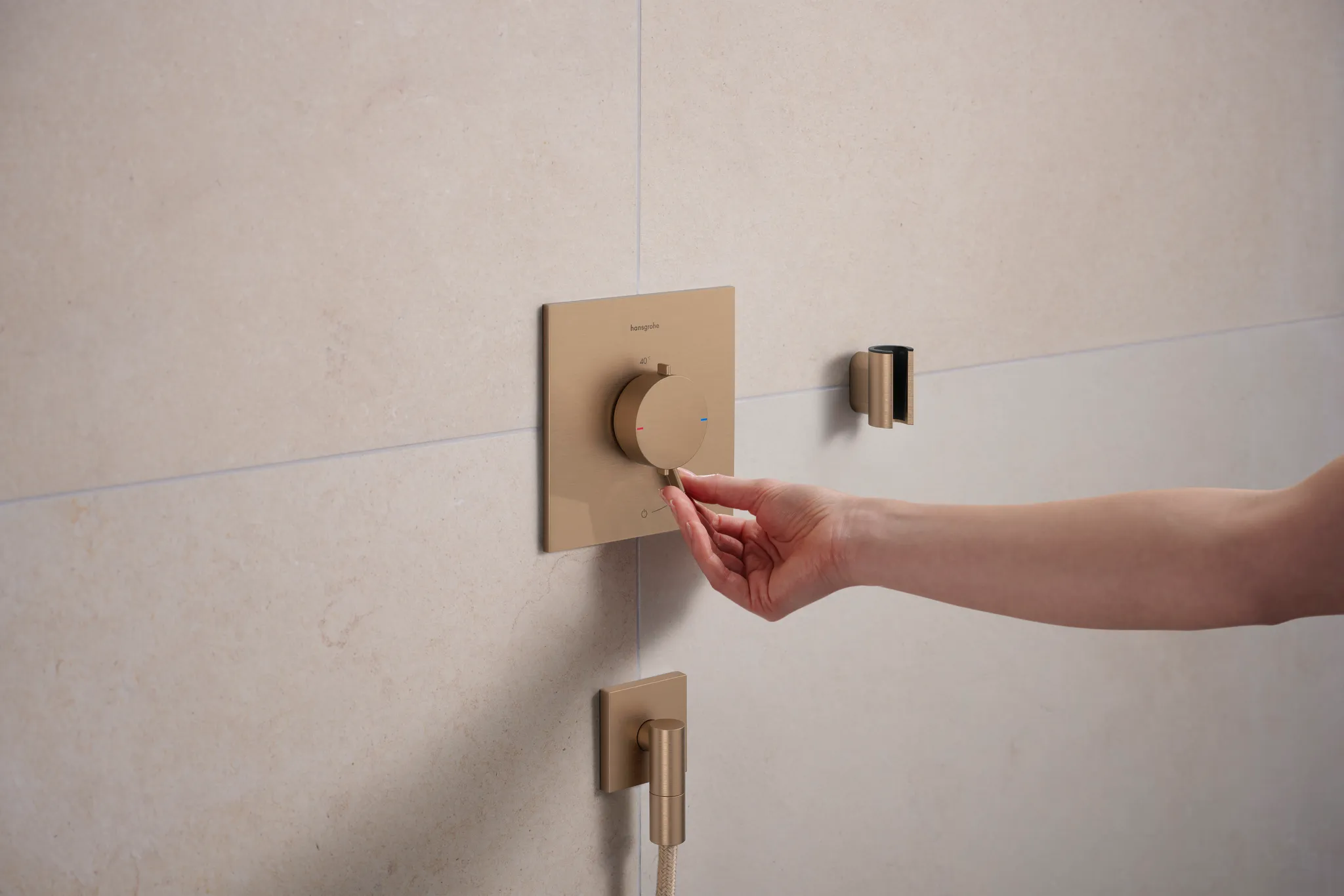 Hansgrohe Brausehalter Porter Fine S BBR, Brushed Bronze, 52 x 31 x 42 mm, konische Aufnahme für Brauseschläuche