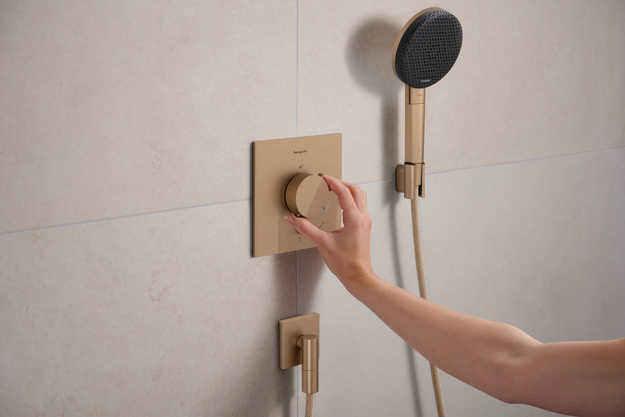 Hansgrohe Brausehalter Porter Fine S BBR, Brushed Bronze, 52 x 31 x 42 mm, konische Aufnahme für Brauseschläuche